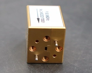 How Does a Waveguide Isolator Prevent Signal Reflection and Backpropagation?